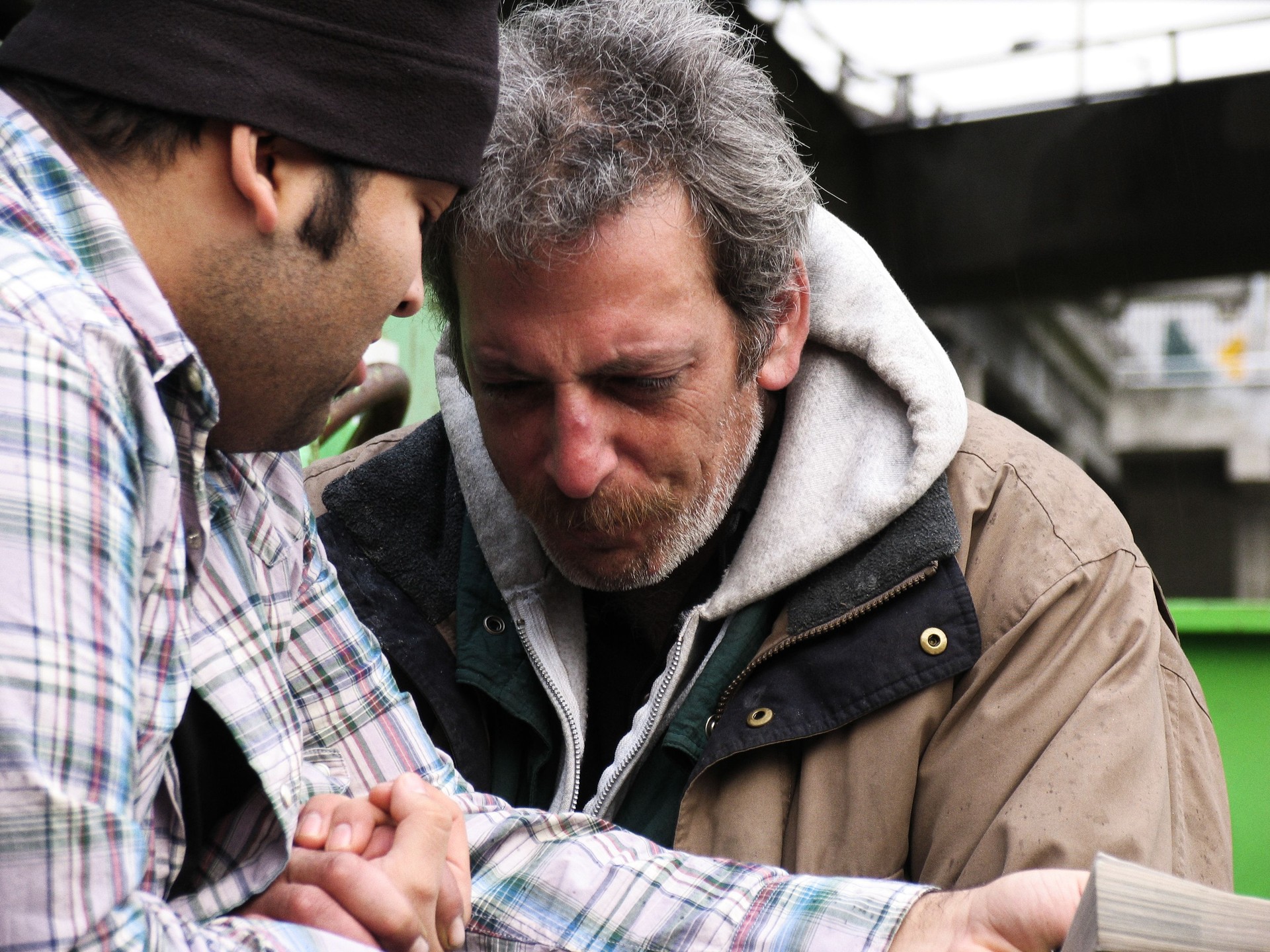 Homeless Male Crying with Listening to Scripture